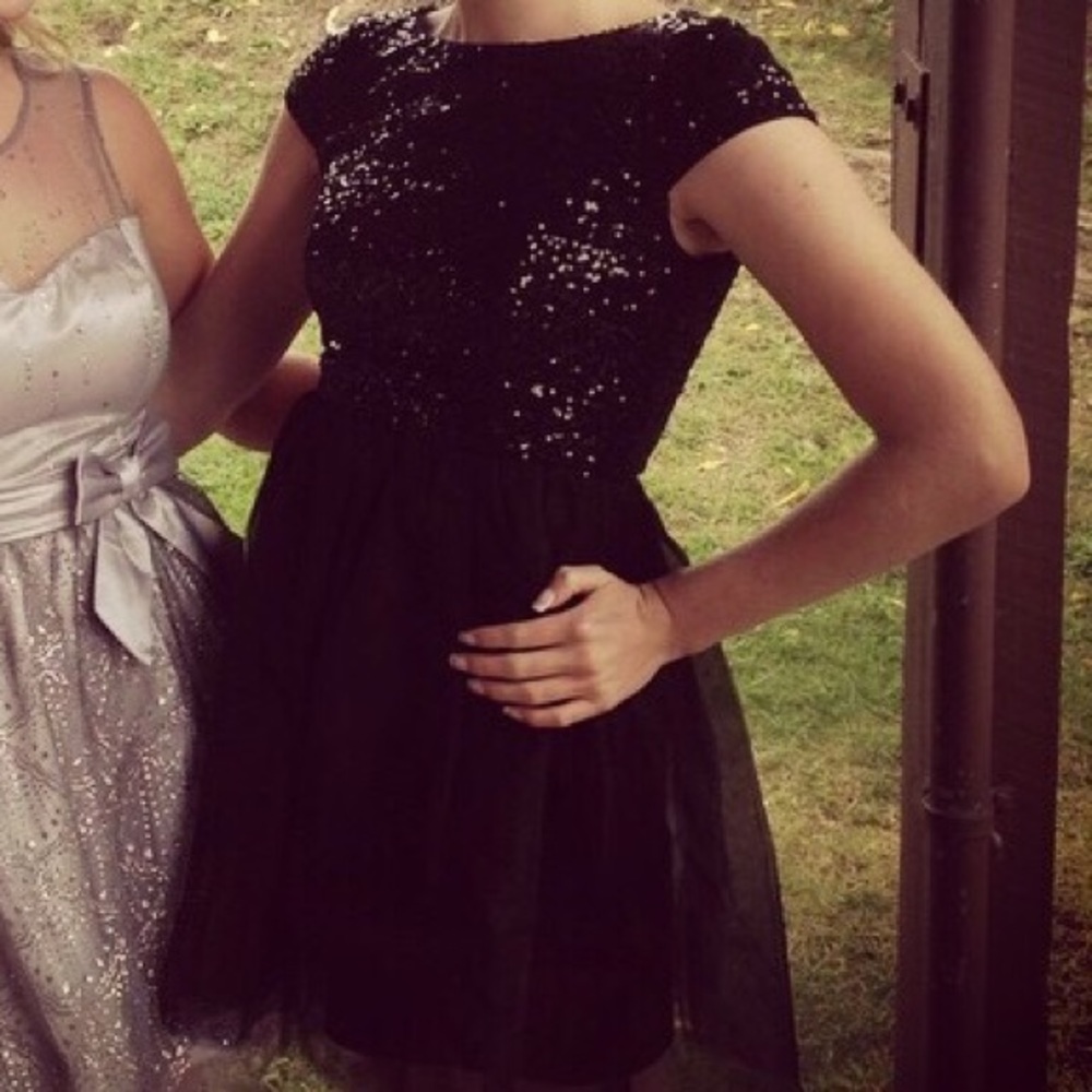 Short black tulle dress with sequence top